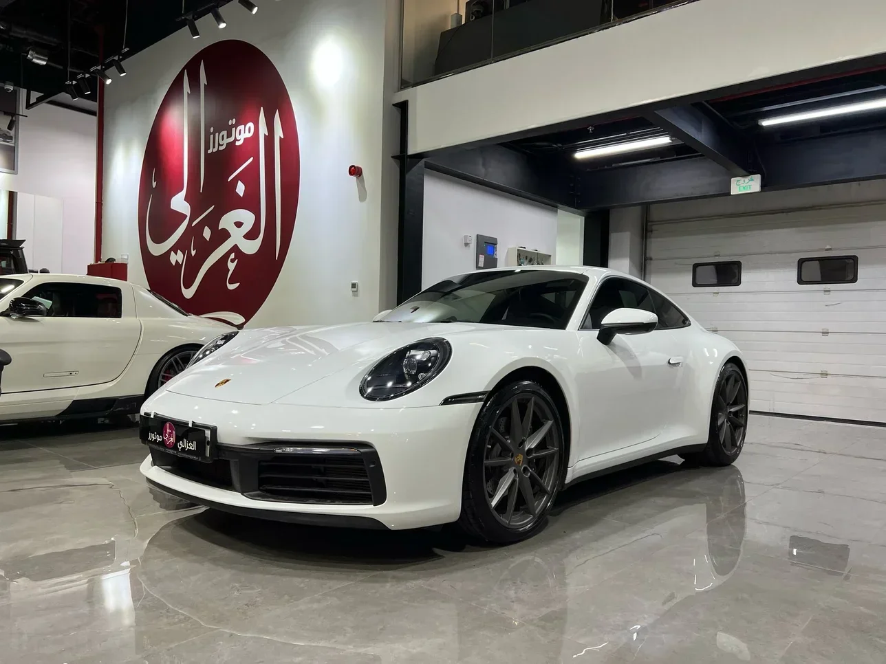 Porsche  911  Carrera  2024  Automatic  4,000 Km  6 Cylinder  Rear Wheel Drive (RWD)  Coupe / Sport  White  With Warranty