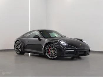 Porsche  911  Carrera S  2020  Automatic  15,000 Km  6 Cylinder  Rear Wheel Drive (RWD)  Coupe / Sport  Black  With Warranty