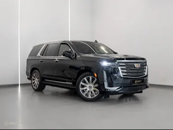 Cadillac  Escalade  Platinum  2021  Automatic  31,900 Km  8 Cylinder  Four Wheel Drive (4WD)  SUV  Black  With Warranty