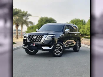 Nissan  Patrol  Platinum  2023  Automatic  25,000 Km  6 Cylinder  Four Wheel Drive (4WD)  SUV  Black  With Warranty