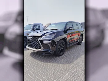  Lexus  LX  570 S Black Edition  2020  Automatic  115,000 Km  8 Cylinder  Four Wheel Drive (4WD)  SUV  Black  With Warranty