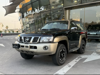 Nissan  Patrol  Super Safari  2021  Automatic  14,000 Km  6 Cylinder  Four Wheel Drive (4WD)  SUV  Black  With Warranty