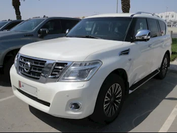  Nissan  Patrol  Platinum  2014  Automatic  260,000 Km  8 Cylinder  Four Wheel Drive (4WD)  SUV  White  With Warranty