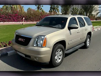 GMC  Yukon  2012  Automatic  220,000 Km  8 Cylinder  Four Wheel Drive (4WD)  SUV  Gold