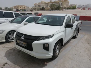 Mitsubishi  L 200  2020  Manual  198,000 Km  4 Cylinder  Rear Wheel Drive (RWD)  Pick Up  White