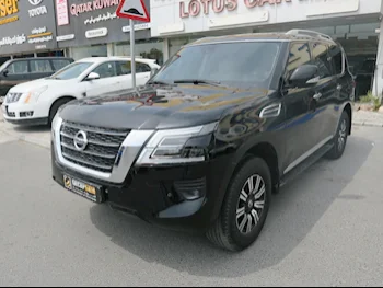 Nissan  Patrol  Titanium  2021  Automatic  88,000 Km  6 Cylinder  Four Wheel Drive (4WD)  SUV  Black