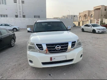 Nissan  Patrol  Platinum  2014  Automatic  255,000 Km  8 Cylinder  Four Wheel Drive (4WD)  SUV  Pearl