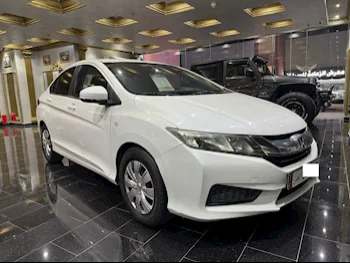 Honda  City  2014  Automatic  75,000 Km  4 Cylinder  Front Wheel Drive (FWD)  Sedan  White