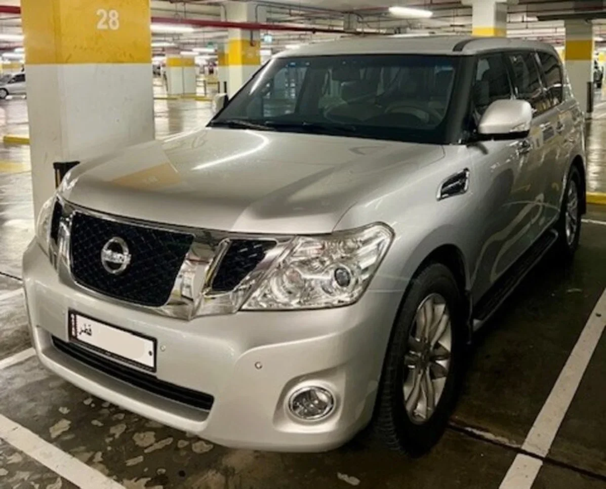 Nissan  Patrol  LE Titanium  2012  Automatic  141,000 Km  8 Cylinder  Four Wheel Drive (4WD)  SUV  Silver