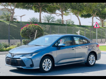 Toyota  Corolla  4 Cylinder  Sedan  Blue  2025