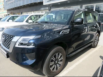 Nissan  Patrol  XE  2024  Automatic  0 Km  6 Cylinder  Four Wheel Drive (4WD)  SUV  Dark Blue  With Warranty