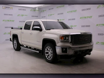 GMC  Sierra  1500  2015  Automatic  269,000 Km  8 Cylinder  Four Wheel Drive (4WD)  Pick Up  White