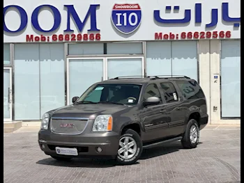 GMC  Yukon  XL  2014  Automatic  232,000 Km  8 Cylinder  Four Wheel Drive (4WD)  SUV  Brown