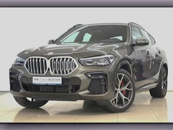 BMW  X-Series  X6 40i  2023  Automatic  35,010 Km  6 Cylinder  All Wheel Drive (AWD)  SUV  Brown  With Warranty