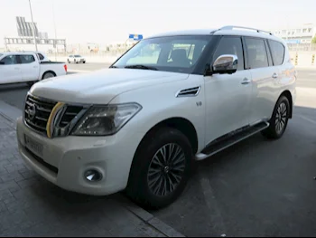 Nissan  Patrol  Platinum  2014  Automatic  158,000 Km  8 Cylinder  Four Wheel Drive (4WD)  SUV  White