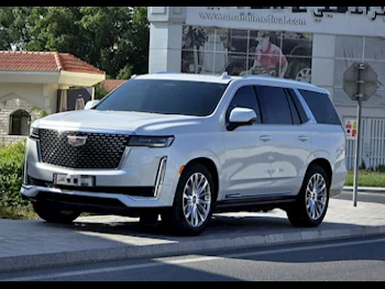 Cadillac  Escalade  Premium  2021  Automatic  65,000 Km  8 Cylinder  Four Wheel Drive (4WD)  SUV  White