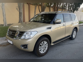 Nissan  Patrol  SE  2014  Automatic  189,200 Km  8 Cylinder  Four Wheel Drive (4WD)  SUV  Gold