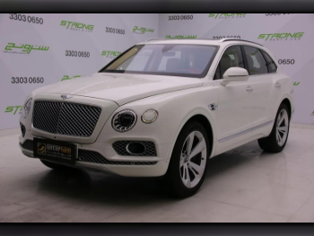 Bentley  Bentayga  2017  Automatic  58,500 Km  12 Cylinder  Four Wheel Drive (4WD)  SUV  White