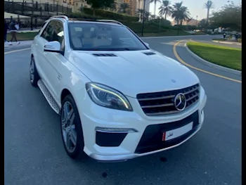 Mercedes-Benz  ML  63 AMG  2013  Automatic  116,000 Km  8 Cylinder  All Wheel Drive (AWD)  SUV  White