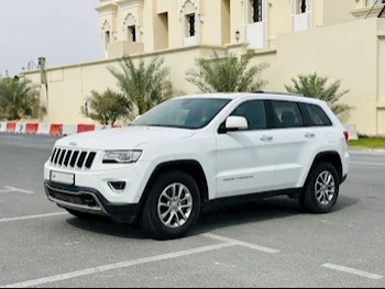 Jeep  Grand Cherokee  Limited  2016  Automatic  20,000 Km  6 Cylinder  Four Wheel Drive (4WD)  SUV  White