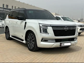 Nissan  Patrol  Platinum  2025  Automatic  0 Km  6 Cylinder  Four Wheel Drive (4WD)  SUV  White  With Warranty
