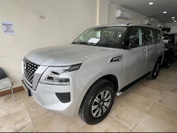 Nissan  Patrol  XE  2024  Automatic  0 Km  6 Cylinder  Four Wheel Drive (4WD)  SUV  Silver  With Warranty