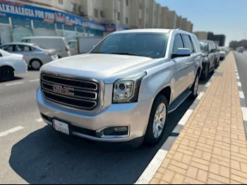 GMC  Yukon  SLE  2015  Automatic  213,000 Km  8 Cylinder  Rear Wheel Drive (RWD)  SUV  Silver