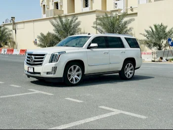 Cadillac  Escalade  Premium  2015  Automatic  125,000 Km  8 Cylinder  Four Wheel Drive (4WD)  SUV  White