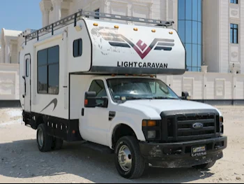 Caravan - Light Caravan  - Super Duty  - 2010  - White and Gray  -Made in United States of America(USA)  - 83,000 Km