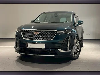 Cadillac  XT6  400 Premium Luxury  2024  Automatic  4,600 Km  6 Cylinder  Four Wheel Drive (4WD)  SUV  Dark Blue  With Warranty