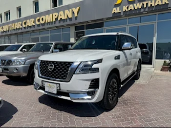 Nissan  Patrol  Platinum  2022  Automatic  47,000 Km  8 Cylinder  Four Wheel Drive (4WD)  SUV  White