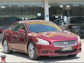 Nissan  Maxima  2010  Automatic  87,000 Km  6 Cylinder  Rear Wheel Drive (RWD)  Sedan  Maroon