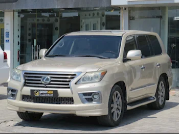 Lexus  LX  570  2015  Automatic  303,000 Km  8 Cylinder  Four Wheel Drive (4WD)  SUV  Gold