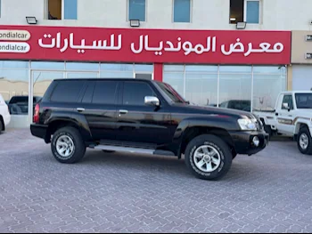 Nissan  Patrol  Safari  2023  Manual  37,000 Km  6 Cylinder  Four Wheel Drive (4WD)  SUV  Black  With Warranty