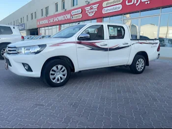 Toyota  Hilux  2023  Automatic  8,000 Km  4 Cylinder  Front Wheel Drive (FWD)  Pick Up  White  With Warranty