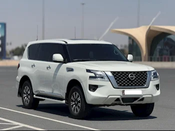 Nissan  Patrol  Platinum  2012  Automatic  71,000 Km  8 Cylinder  Four Wheel Drive (4WD)  SUV  White