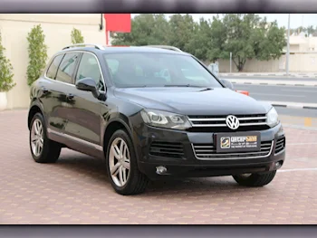  Volkswagen  Touareg  Sport  2012  Automatic  172,000 Km  6 Cylinder  All Wheel Drive (AWD)  SUV  Black  With Warranty