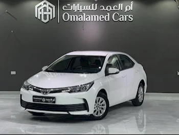 Toyota  Corolla  2019  Automatic  104,000 Km  4 Cylinder  Front Wheel Drive (FWD)  Sedan  White