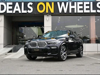 BMW  X-Series  X6 40i  2020  Automatic  56,000 Km  6 Cylinder  All Wheel Drive (AWD)  SUV  Black  With Warranty