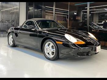 Porsche  Boxster  1998  Automatic  41,000 Km  4 Cylinder  Rear Wheel Drive (RWD)  Convertible  Black