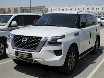 Nissan  Patrol  XE  2023  Automatic  67,000 Km  6 Cylinder  Four Wheel Drive (4WD)  SUV  White