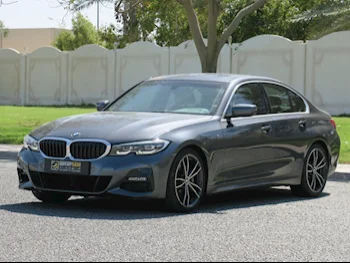  BMW  3-Series  330i  2021  Automatic  78,000 Km  4 Cylinder  Rear Wheel Drive (RWD)  Sedan  Gray  With Warranty