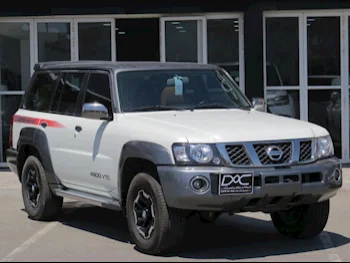 Nissan  Patrol  Super Safari  2021  Automatic  83,000 Km  6 Cylinder  Four Wheel Drive (4WD)  SUV  White