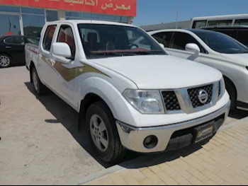 نيسان  نافارا  أس اي  2014  اوتوماتيك  354,000 كم  4 سلندر  دفع خلفي  بيكب  أبيض