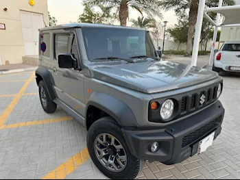 Suzuki  Jimny  2023  Automatic  45,000 Km  4 Cylinder  Four Wheel Drive (4WD)  SUV  Gray  With Warranty