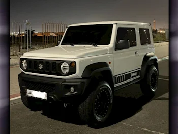 Suzuki  Jimny  2022  Automatic  35,000 Km  4 Cylinder  Four Wheel Drive (4WD)  SUV  White  With Warranty