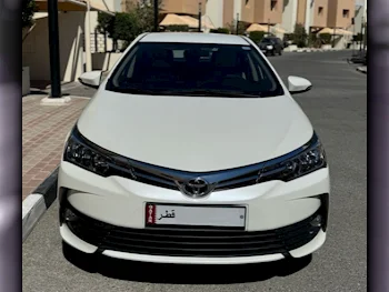 Toyota  Corolla  GLI  2017  Automatic  95,000 Km  4 Cylinder  Front Wheel Drive (FWD)  Sedan  White