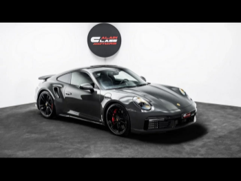 Porsche  911  Turbo  2024  Automatic  14,690 Km  6 Cylinder  Rear Wheel Drive (RWD)  Coupe / Sport  Gray