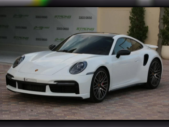 Porsche  911  Turbo  2022  Automatic  27,000 Km  6 Cylinder  Rear Wheel Drive (RWD)  Coupe / Sport  White  With Warranty