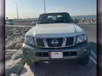 Nissan  Patrol  Super Safari  2021  Automatic  74,000 Km  6 Cylinder  Four Wheel Drive (4WD)  SUV  White